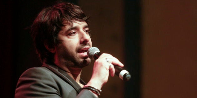 PORTLAND, OR - APRIL 24: Jian Ghomeshi records a live show at Aladdin Theater on April 24, 2014 in Portland, Oregon. (Photo by Natalie Behring/Getty Images)