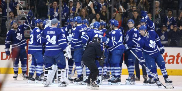 TORONTO, ON- NOVEMBER 22 - Leafs salute the fans after the win in third period action as the Toronto Maple Leafs beat the Detroit Red Wings 4-1 in the Air Canada Centre in Toronto. November 22, 2014. (Steve Russell/Toronto Star via Getty Images)