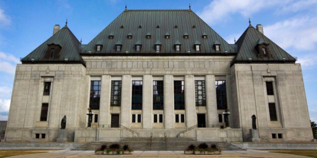 The Supreme Court of Canada stands in Ottawa, Ontario, Canada, on Wednesday, Aug. 10, 2011. Canada's trade deficit widened more than forecast in June, signaling that the economy may have stalled or even contracted in the second quarter. Photographer: Brent Lewin/Bloomberg via Getty Images