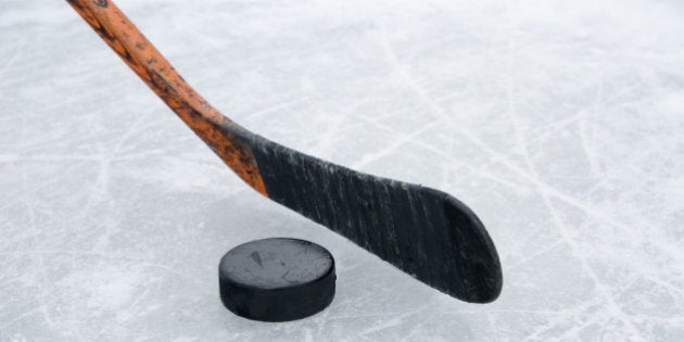 hockey puck and stick