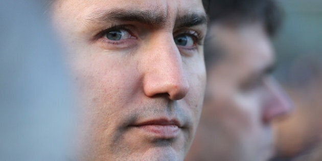 OTTAWA, ON- OCTOBER 23 - Liberal Leader Justin Trudeau looks toward the War Memorial during a vigil in the aftermath of a shooting in Ottawa, where a soldier murdered at the War Memorial and a gun battle in Parliament killed the alleged gun man. in Ottawa. October 23, 2014. (Steve Russell/Toronto Star via Getty Images)