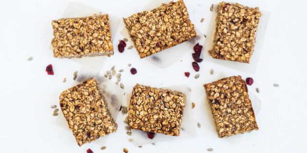 Healthy oat granola bars on white background, top view
