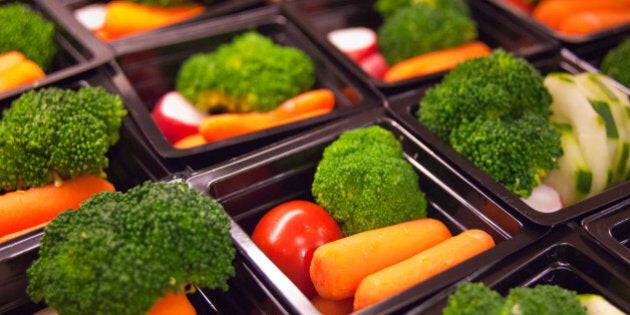 Fresh vegetable cups prepared for the National School Lunch Program at Washington-Lee High School in Arlington, Virginia, on Wednesday, October 19, 2011. The National School Lunch Program is a federally assisted meal program administered by the United States Department of Agriculture, Food and Nutrition Service operating in public, nonprofit private schools and residential child care institutions. It provides nutritionally balanced, low-cost or free lunches to children each school day. USDA Photo by Bob Nichols.