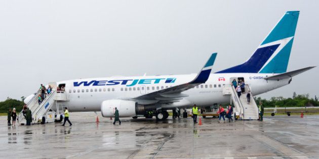 ABEL SANTAMARIA AIRPORT, SANTA CLARA, VILLA CLARA, CUBA - 2014/08/11: Westjet airline is the second most important in Canada after Air Canada.The company is a Canadian low-cost carrier that provides scheduled and charter air service. (Photo by Roberto Machado Noa/LightRocket via Getty Images)