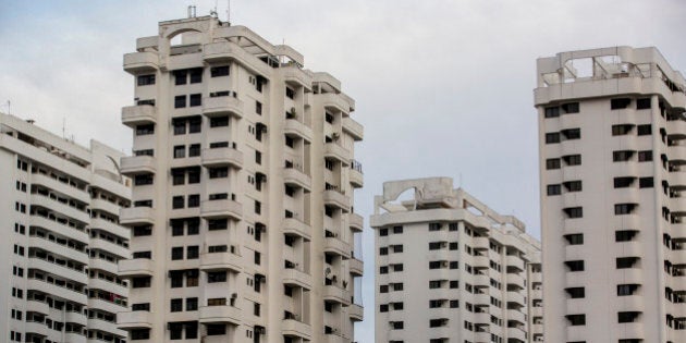 Residential buildings stand in the Barra da Tijuca neighborhood of Rio de Janeiro, Brazil, on Friday, Aug. 28, 2015. The real-estate industry, which is equal to about 10 percent of Brazil's economy, is emerging as one of the latest casualties of a recession that analysts forecast will be its longest since the 1930s. Photographer: Dado Galdieri/Bloomberg via Getty Images