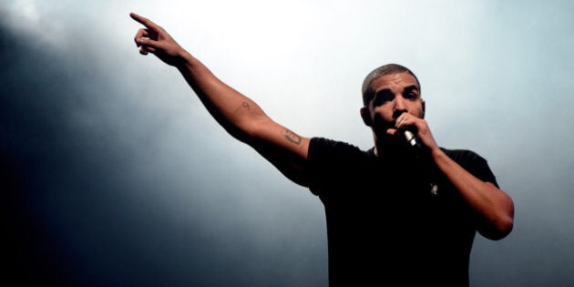 FILE - In this June 27, 2015, file photo, Canadian singer Drake performs at the Wireless festival in Finsbury Park, in London. Drake has broken his silence on a deadly shooting at an after-party for his music festival at a downtown Toronto nightclub Aug. 4. (Photo by Jonathan Short/Invision/AP, File)