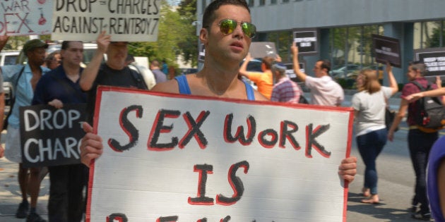 U S EASTERN DISTRICT COURTHOUSE, BROOKLYN, NEW YORK, UNITED STATES - 2015/08/30: A demonstrator protests the shutdown of Rentboy.com. Activists from New York City's LGBTQ community held a rally outside the U.S. Eastern District Courthouse in Brooklyn to protest the recent raid of Rentboy.com, a male escort service site whose CEO Jeffrey Hurant was arrested along with six others on 25 August 2015. (Photo by Albin Lohr-Jones/Pacific Press/LightRocket via Getty Images)