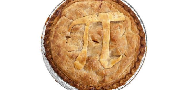 A mathematical symbol of pi on a baked pastry apple pie.
