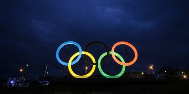 View of the Olympic rings at Madureira Park, the third largest park in Rio de Janeiro, Brazil, on July 1, 2015, 400 days ahead of the Rio 2016 Olympic games. The 12-meter-high symbol was shipped from Great Britain after having decorated the Tyne Bridge in Newcastle during the 2012 London Olympic Games. AFP PHOTO / YASUYOSHI CHIBA (Photo credit should read YASUYOSHI CHIBA/AFP/Getty Images)