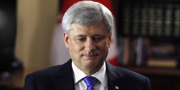 Stephen Harper, Canada's prime minister, looks on after a Bloomberg Television interview in Ottawa, Ontario, Canada, on Wednesday, July 29, 2015. Harper said U.S. delays in approving the Keystone XL pipeline are 'not a hopeful sign' and reflect the 'peculiar politics' of the Obama administration. Photographer: Patrick Doyle/Bloomberg via Getty Images