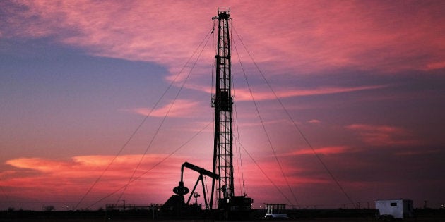 MIDLAND, TX - FEBRUARY 05: An oil drill is viewed near a construction site for homes and office buildings on February 5, 2015 in Midland, Texas. As crude oil prices have fallen nearly 60 percent globally, American communities dependent on oil revenue prepare for hard times. Texas, which benefited from hydraulic fracturing and the shale drilling revolution, tripled its production of oil in the last five years. The Texan economy saw hundreds of billions of dollars come into the state before the global plunge in prices. Across the state drilling budgets are being slashed and companies are notifying workers of upcoming layoffs. According to federal labor statistics, around 300,000 people work in the Texas oil and gas industry, 50 percent more than four years ago. (Photo by Spencer Platt/Getty Images)
