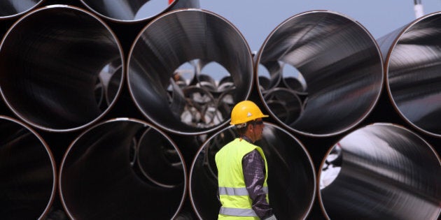 Some of the first pipes to arrive for the Trans-Adriatic Pipeline (TAP) project in Durres, Albania, Monday, April 18, 2016. Albania is part of the 878-kilometer (545 miles) TAP project that will bring gas from the Shah Deniz II field in Azerbaijan, across Turkey, Greece, Albania and undersea into southern Italy. (AP Photo/Hektor Pustina)