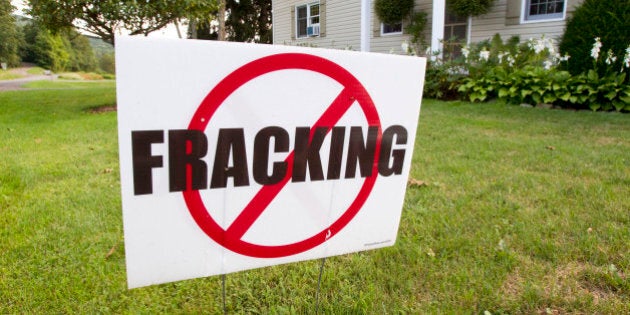 An anti-hydrofracking sign stands near the Ommegang Brewery in Cooperstown, New York, U.S., on Tuesday, Aug. 17, 2011. Brewery Ommegang says a leak of fracking fluid would ruin the water it draws from aquifers to craft its Belgian ale. The brewery calls hydraulic fracturing, or fracking, used to free natural gas from shale, a 'material threat' to its business. Photographer: Michael Okoniewski/Bloomberg via Getty Images