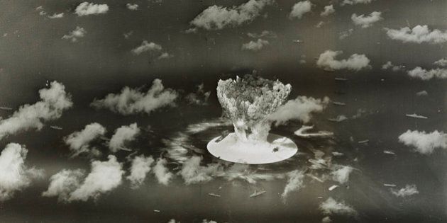 A mushroom cloud rises with ships below during Operation Crossroads nuclear weapons test on Bikini Atoll, Marshall Islands in this 1946 handout provided by the U.S. Library of Congress. The United States said on April 25, 2014, it was examining lawsuits filed by the Marshall Islands against it and eight other nuclear-armed countries that accuse them of failing in their obligation to negotiate nuclear disarmament. REUTERS/U.S. Library of Congress/Handout via Reuters (MARSHALL ISLANDS - Tags: POLITICS MILITARY CONFLICT) ATTENTION EDITORS - FOR EDITORIAL USE ONLY. NOT FOR SALE FOR MARKETING OR ADVERTISING CAMPAIGNS. THIS PICTURE WAS PROVIDED BY A THIRD PARTY. REUTERS IS UNABLE TO INDEPENDENTLY VERIFY THE AUTHENTICITY, CONTENT, LOCATION OR DATE OF THIS IMAGE. THIS PICTURE IS DISTRIBUTED EXACTLY AS RECEIVED BY REUTERS, AS A SERVICE TO CLIENTS