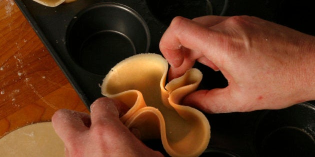 Place in greased muffin tin for pie step-by-step on NOVEMBER 08, 2012. (Photo by Bob Chamberlin/Los Angeles Times via Getty Images)