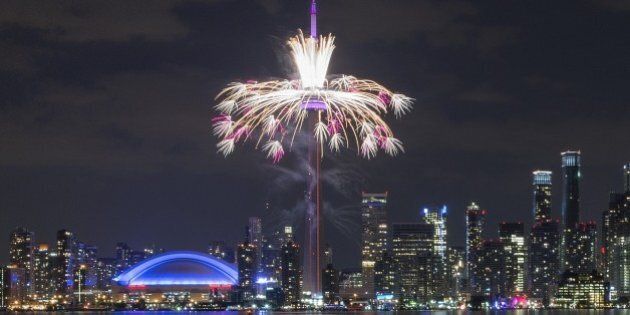 Fireworks shoot off from the CN Tower during the opening ceremony for the 2015 Pan American Games in Toronto, Ontario, July 10, 2015. AFP PHOTO/ JIM WATSON (Photo credit should read JIM WATSON/AFP/Getty Images)