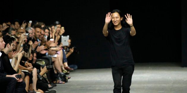 FILE - This Sept. 8, 2012 file photo shows designer Alexander Wang after his Spring 2013 collection was modeled during Fashion Week, in New York. Wang is taking over the creative direction of storied Paris fashion house Balenciaga.The company made the announcement on Monday, Dec. 3, that 28-year-old Wang would fill the spot vacated last month by Nicolas Ghesquiere. (AP Photo/Richard Drew, file)