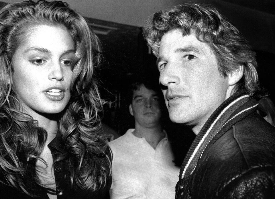 Here's Richard Gere, Cindy Crawford and some guy who deeply regrets being photographed between such a ridiculously good looking couple. (1988)