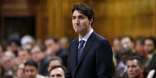 Canada's Prime Minister Justin Trudeau pauses while paying tribute to the late Conservative MP Jim Hillyer, who was found dead in his office on Wednesday, in the House of Commons on Parliament Hill in Ottawa, Canada, March 23, 2016. REUTERS/Chris Wattie