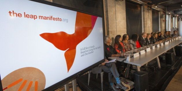 The panel sits during a news conference to launch the