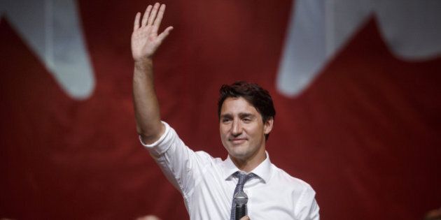 Justin Trudeau, Canada's prime minister, waves during the end of a town hall event in Bellevile, Ontario, Canada, on Thursday, Jan. 12, 2017. Trudeau confirmed that his senior advisers have met with U.S. President-elect Donald Trump's officials. Photographer: Cole Burston/Bloomberg via Getty Images