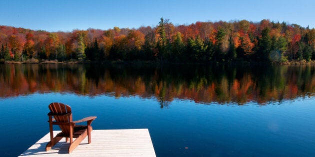 Wooden dock on autumn lake