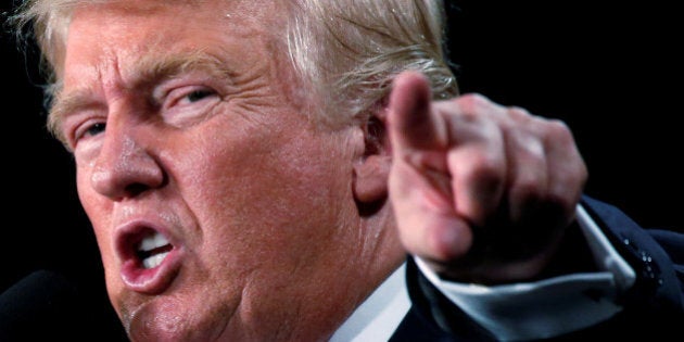 FILE PHOTO: Then Republican presidential nominee Donald Trump speaks at a campaign event in Winston-Salem, North Carolina, U.S., July 25, 2016. REUTERS/Carlo Allegri/File Photo