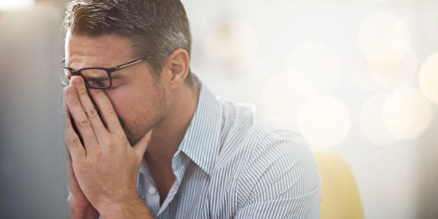 Cropped shot of a stressed businessman sitting at his deskhttp://195.154.178.81/DATA/i_collage/pi/shoots/783721.jpg