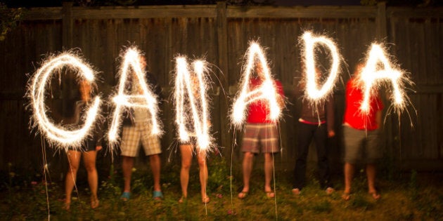 The word Canada in sparklers in time lapse photography as part of Canada Day (July 1) celebration.