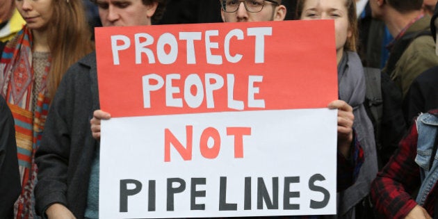 Protesters hold a rally at City Hall before a march against the proposed expansion of Kinder Morgan's Trans Mountain Pipeline in Vancouver, British Columbia, Canada November 19, 2016. REUTERS/Chris Helgren