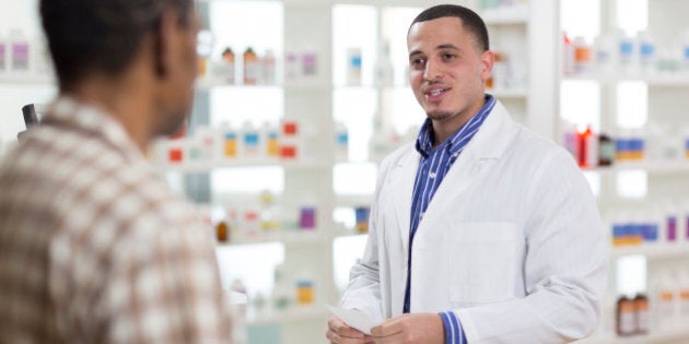 A senior man getting a prescription filled