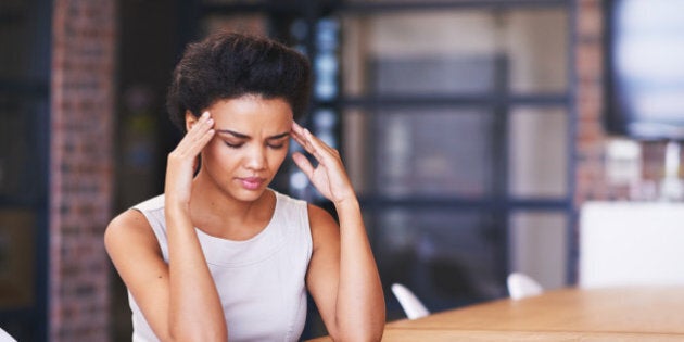 Shot of a businesswoman looking stressed while working at her deskhttp://195.154.178.81/DATA/i_collage/pu/shoots/806205.jpg