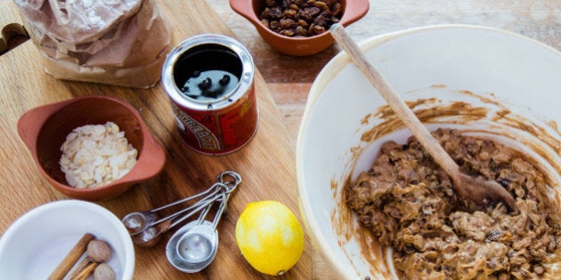 Christmas (rich fruit cake) mix in a bowl with an assortment of ingredients.