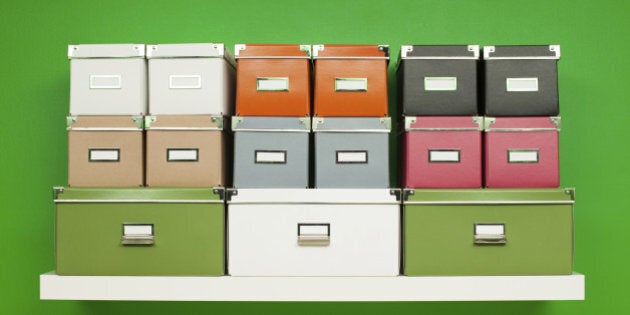 wall shelves with cardboard boxes