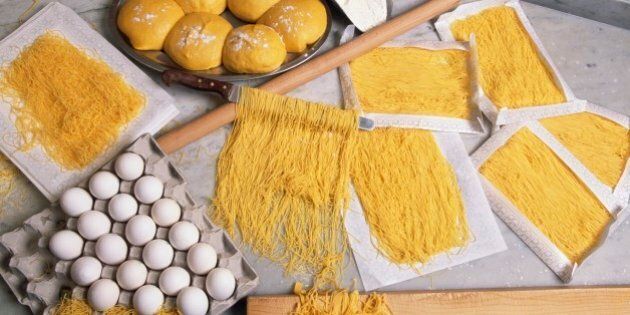 ITALY - MARCH 24: Preparing spinosini, fine egg pasta, Spinosi pasta factory, Campofilone, Marche, Italy. (Photo by DeAgostini/Getty Images)