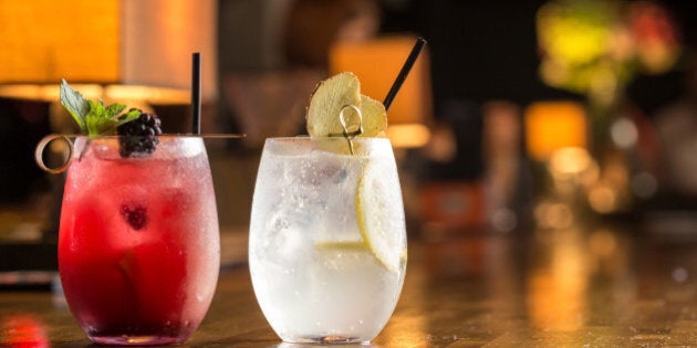 Two glasses of frozen lemonade on bar counterTwo glasses of frozen lemonade on bar counter