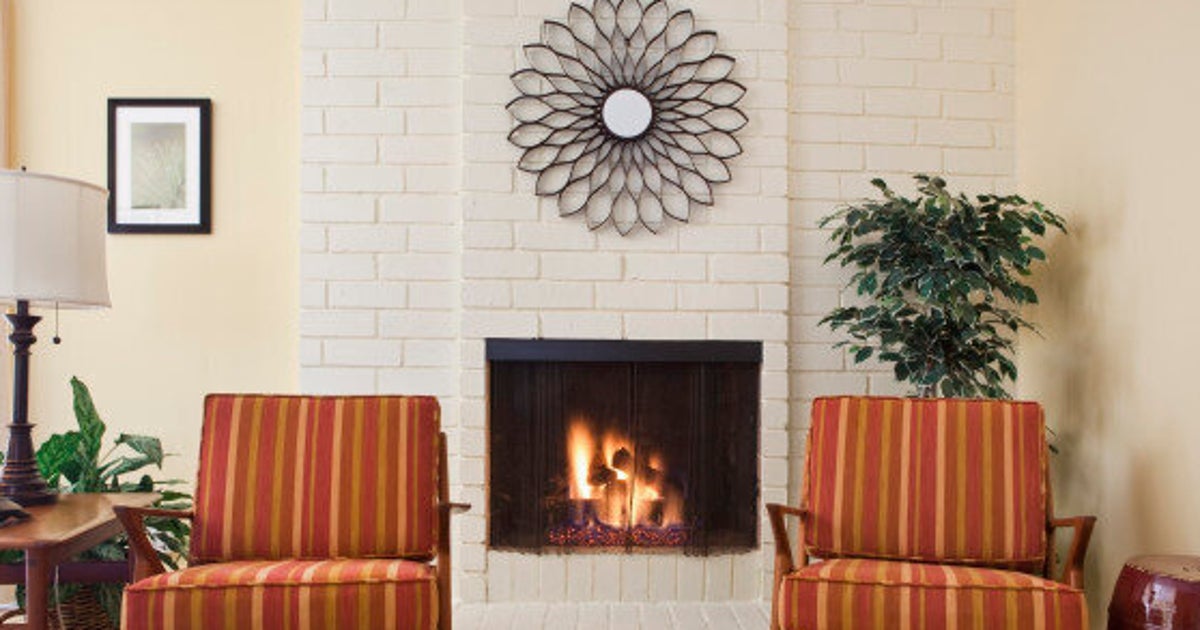 How To Hang Art Above A Fireplace HuffPost Latest News