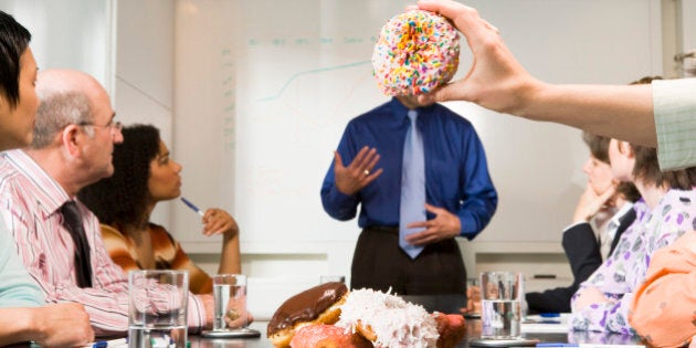 Mocking speaker during business meeting