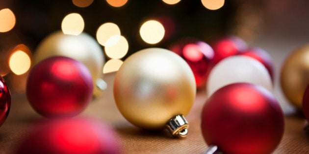 Christmas baubles on table.