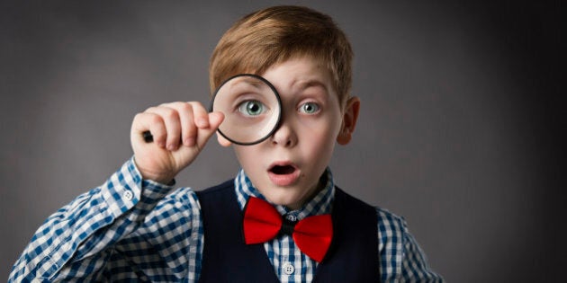 Child See Through Magnifying Glass, Kid Eye Looking with Magnifier Lens, Gray Background