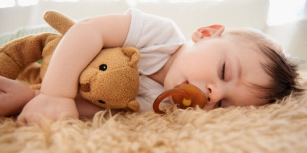 Cropped shot of an adorable baby boy taking a nap