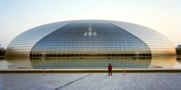 This is the National Grand Theater in Beijing China, also known as 'the Egg'. It is located a block to the West of Tian?anmen Square and is a venue for a variety of performing arts.