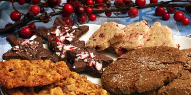 **FOR USE WITH AP LIFESTYLES** **FILE** This Nov. 20, 2006 file photo shows, from left, Chewy Cranberry-Oatmeal Cookies, Chocolate Peppermint Stars, Cranberry-Orange Shortbread Cut-Outs and Giant Ginger Cookies. Holidays are often associated with parties, goodies and the inevitable weight gain. (AP Photo/Larry Crowe, FILE)