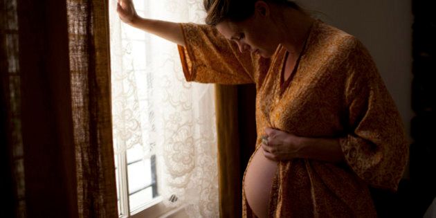 Pregnant woman in labour at home home birth