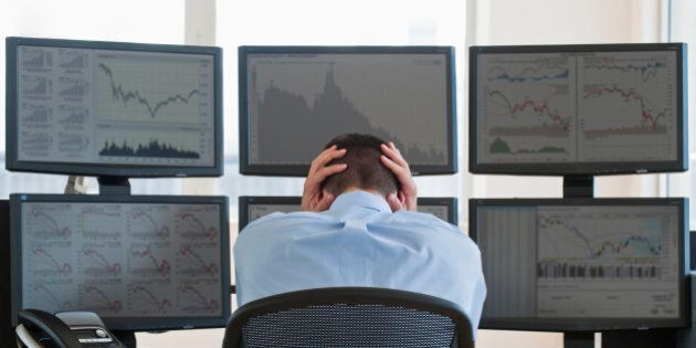 Frustrated male trader at work