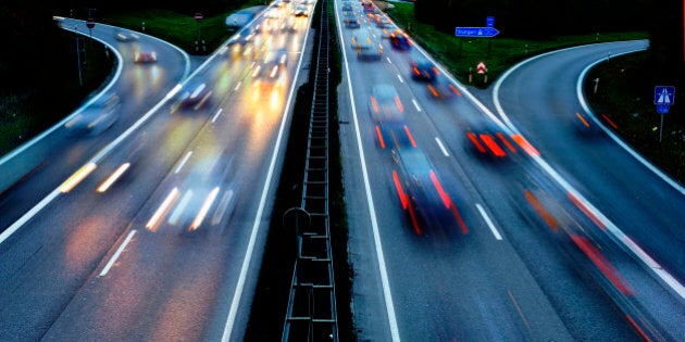 cars on Autobahn highway in Germany in high speed at night