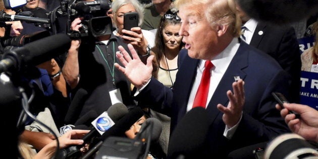 Republican presidential candidate Donald Trump speaks to the media during the National Federation of Republican Assemblies at Rocketown in Nashville, Tennessee August 29, 2015. REUTERS/Harrison McClary