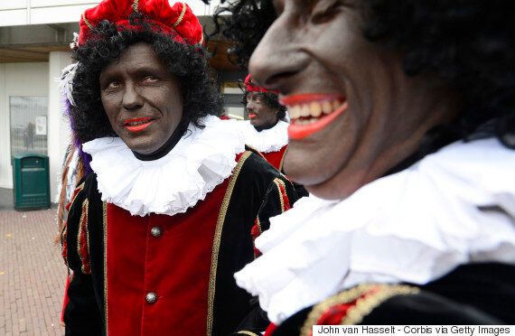 Zwarte Piet, or Black Pete, may be a part of Dutch folklore, but he's controversial both inside and outside of the Netherlands. (Photo: John van Hasselt/Corbis via Getty Images)