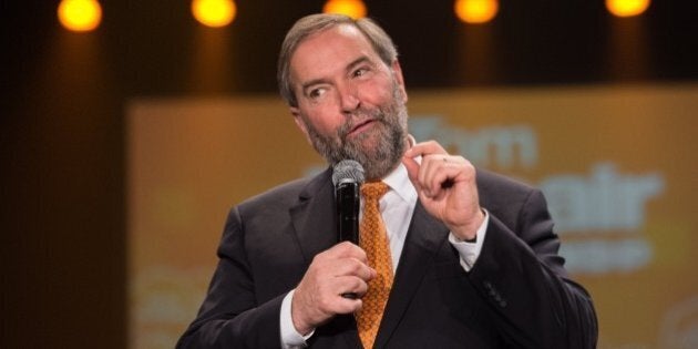 Canadian New Democratic Party (NDP) leader Tom Mulcair speaks at a rally in Montreal on October 18, 2015. Canadians go to the polls on October 19 with the option of choosing to 'stay the course' with the Conservatives or plump for change touted by the Liberals and New Democrats, in legislative elections too close to call. AFP PHOTO/NICHOLAS KAMM (Photo credit should read NICHOLAS KAMM/AFP/Getty Images)