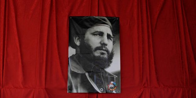 A photograph of the late Fidel Castro hangs at a memorial in his honor in Guanabacoa on the outskirts of Havana, Cuba, Monday, Nov. 28, 2016. Tribute sites are set up in hundreds of places across the country to bid farewell Castro, who died on Nov. 25 at age 90. (AP Photo/Natacha Pisarenko)